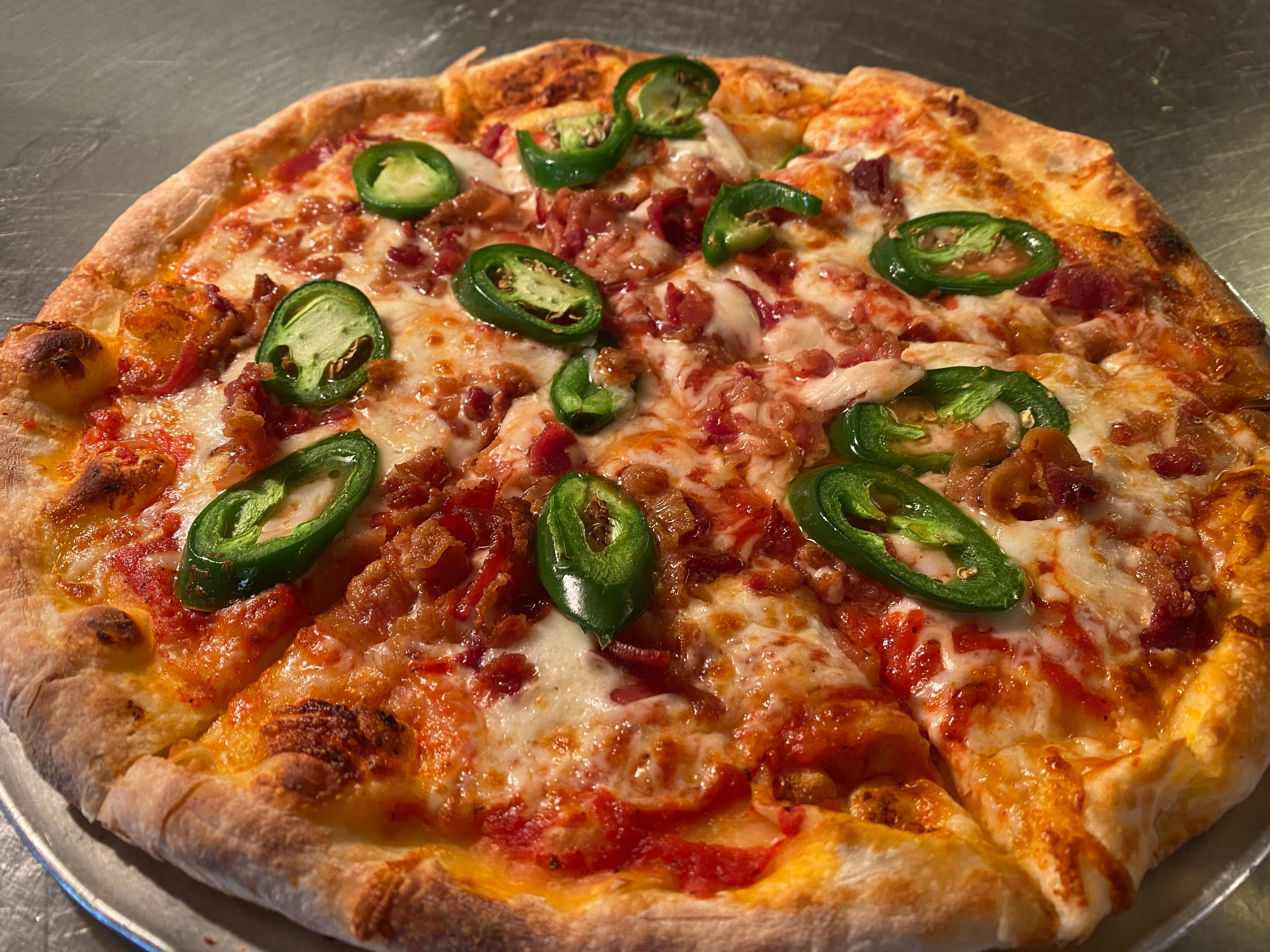 Tommy V's Heatlovers Bacon & Jalapeno Pizza.